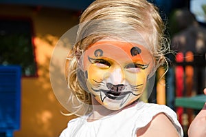 Girl with tiger face painting