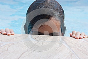 Girl about to leave swimming pool