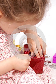 Girl about to open her Christmas presents