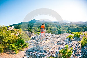 Girl at the top of the mountain.