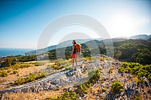 Girl at the top of the mountain