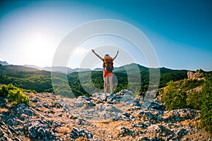 Girl at the top of the mountain