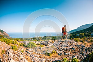 Girl at the top of the mountain