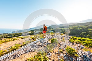 Girl at the top of the mountain