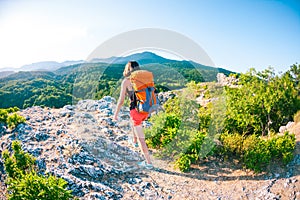 Girl at the top of the mountain