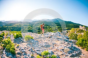 Girl at the top of the mountain