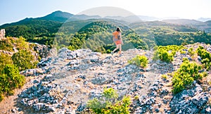 Girl at the top of the mountain