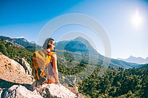 Girl at the top of the mountain