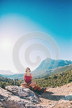 Girl at the top of the mountain