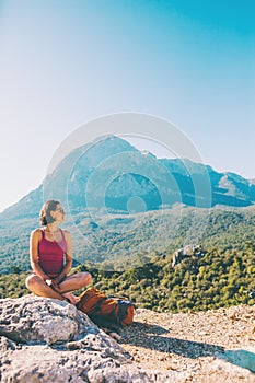 Girl at the top of the mountain