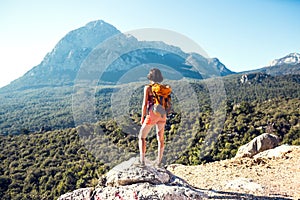 Girl at the top of the mountain