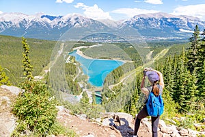 Staycation hike on top of mountain overlooking local town of Canmore and Kananaskis photo