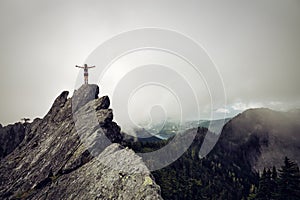 Girl on top of a Rocky Canadian Mountain