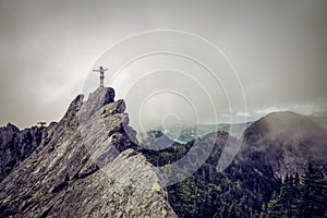 Girl on top of a Rocky Canadian Mountain