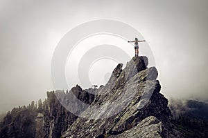 Girl on top of a Rocky Canadian Mountain