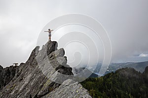 Girl on top of a Rocky Canadian Mountain