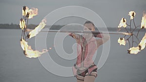 Girl with torch fire show. slow motion S-Log3