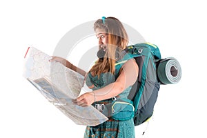 Girl tourist with backpack and map