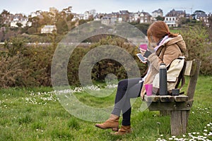 Girl tourist rests on the bench