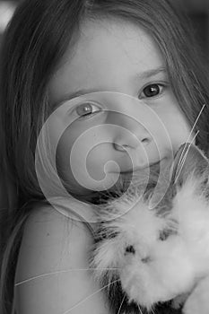 Girl and toy cat