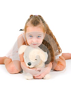 The girl with a toy puppy