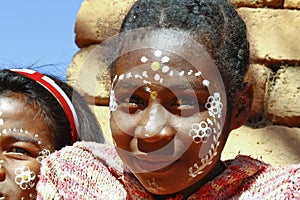 Girl with traditionally painted face