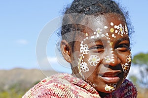 Girl with traditionally painted face