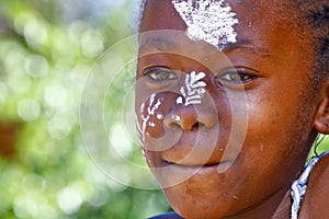 Girl with traditionally painted face