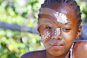 Girl with traditionally painted face