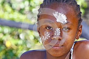 Girl with traditionally painted face