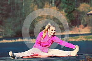 Girl train outside in park.