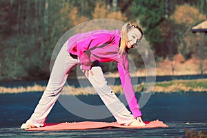 Girl train outside in park.