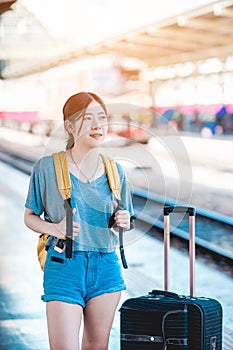 Girl in train station.