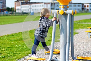 Girl on trainer in spring park