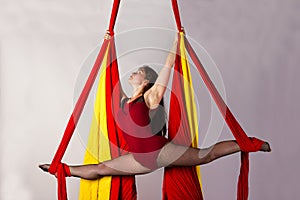 Girl training on aerial silks