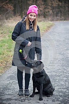 Girl training dog