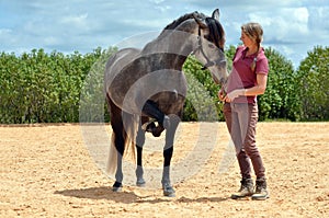 Girl training horse