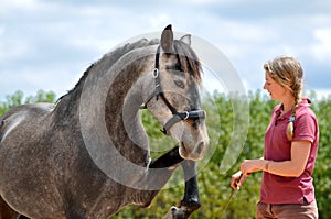 Girl training horse