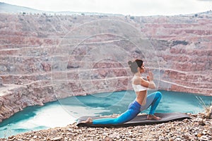 Girl training yoga pose outdoor