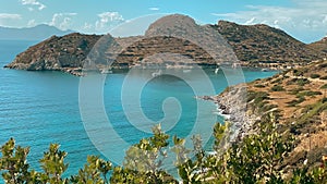 Girl is traveling in Turkey. View of lighthouse in ancient city of Knidos.