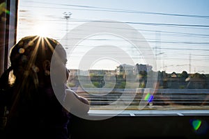 Girl travelling by train