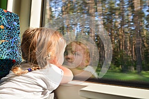 Girl travelling by train