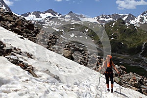 Girl trekking hiking in the Alps, Stubai, Austria