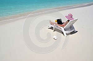 Girl on the tropical beach. Exuma, Bahamas