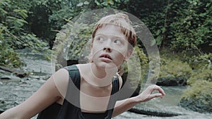 Girl in tropical rain forest jungle