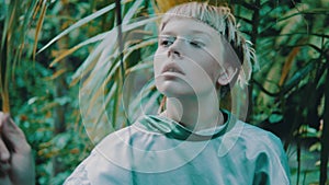 Girl in tropical rain forest jungle