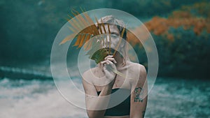 Girl in tropical rain forest jungle