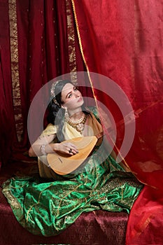 A girl in a Turkish Ottoman historical costume in the style of the magnificent century