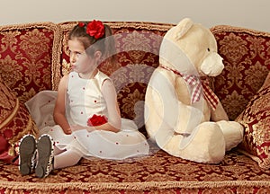 Girl turned away from the Teddy bear