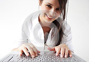 Girl typing laptop keyboard